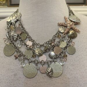 Silver toned ocean inspired artistic necklace